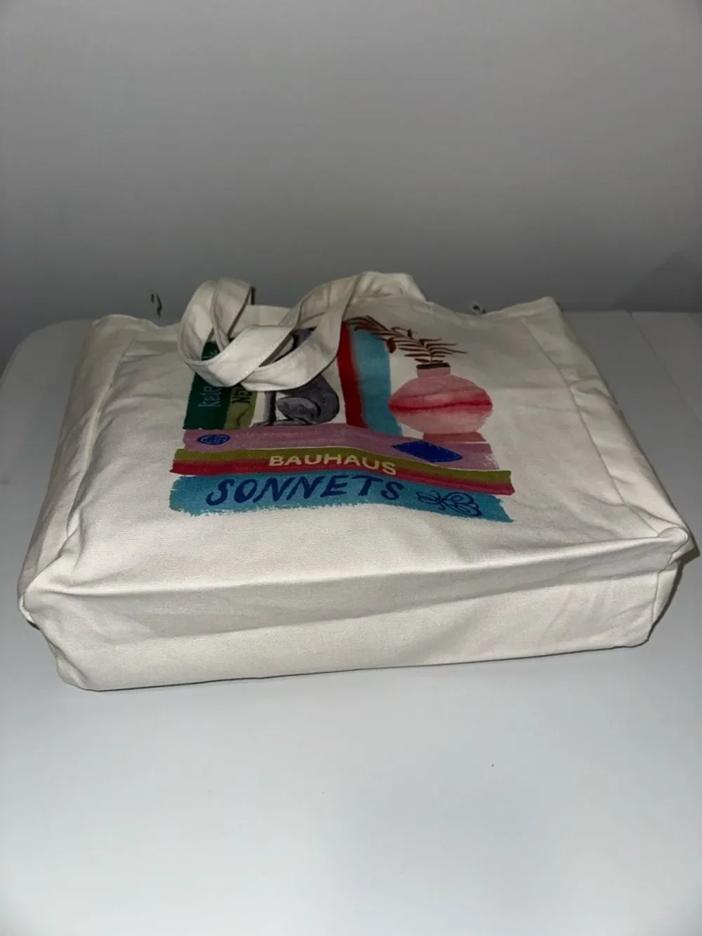 kate spade Ivory Multi Bookshelf Dog Figurine Canvas Tote Bag